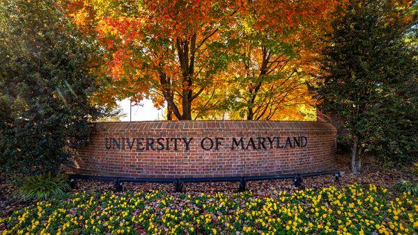 UMD sign with fall foliage