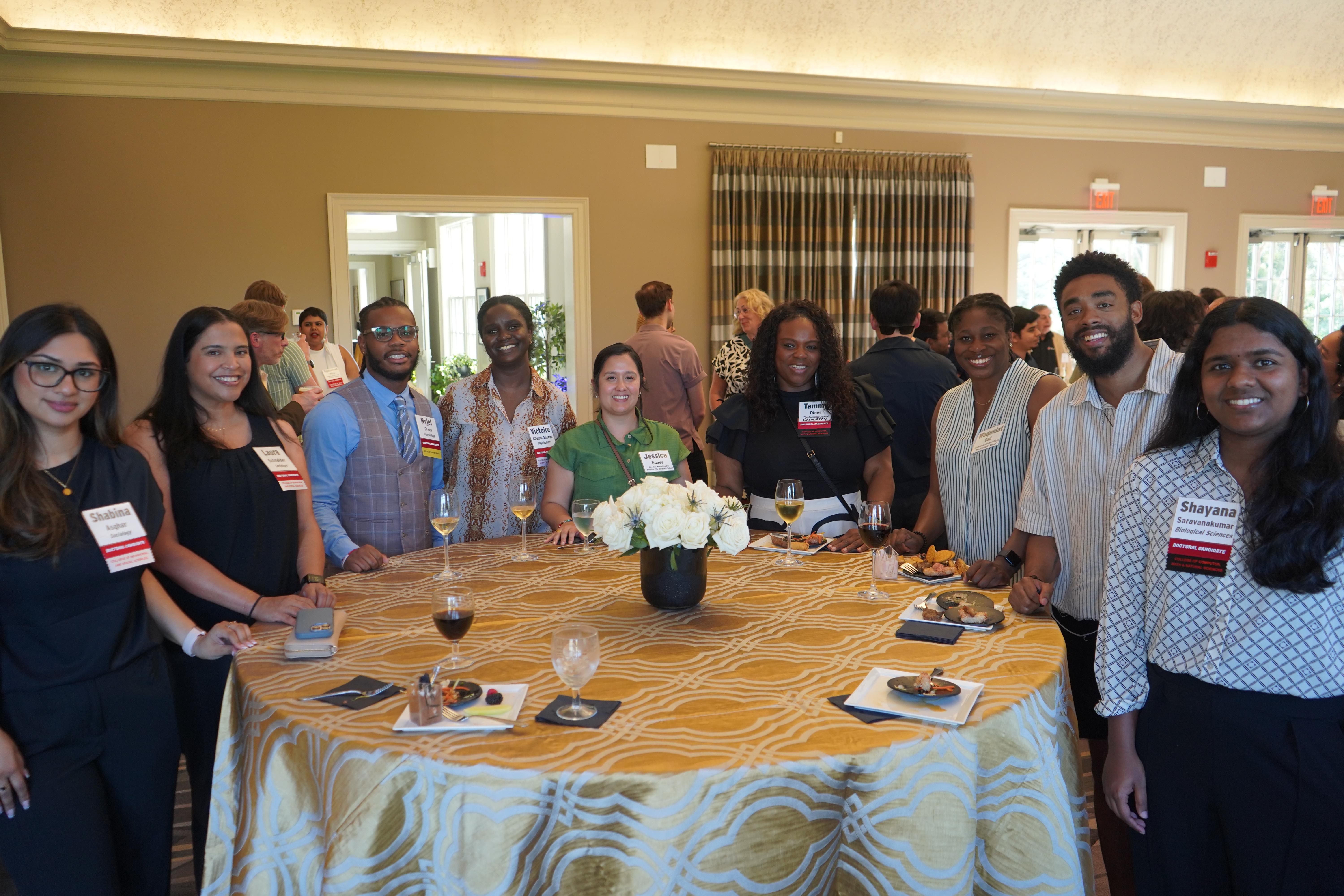 Large group of Doctoral Candidates at a celebration