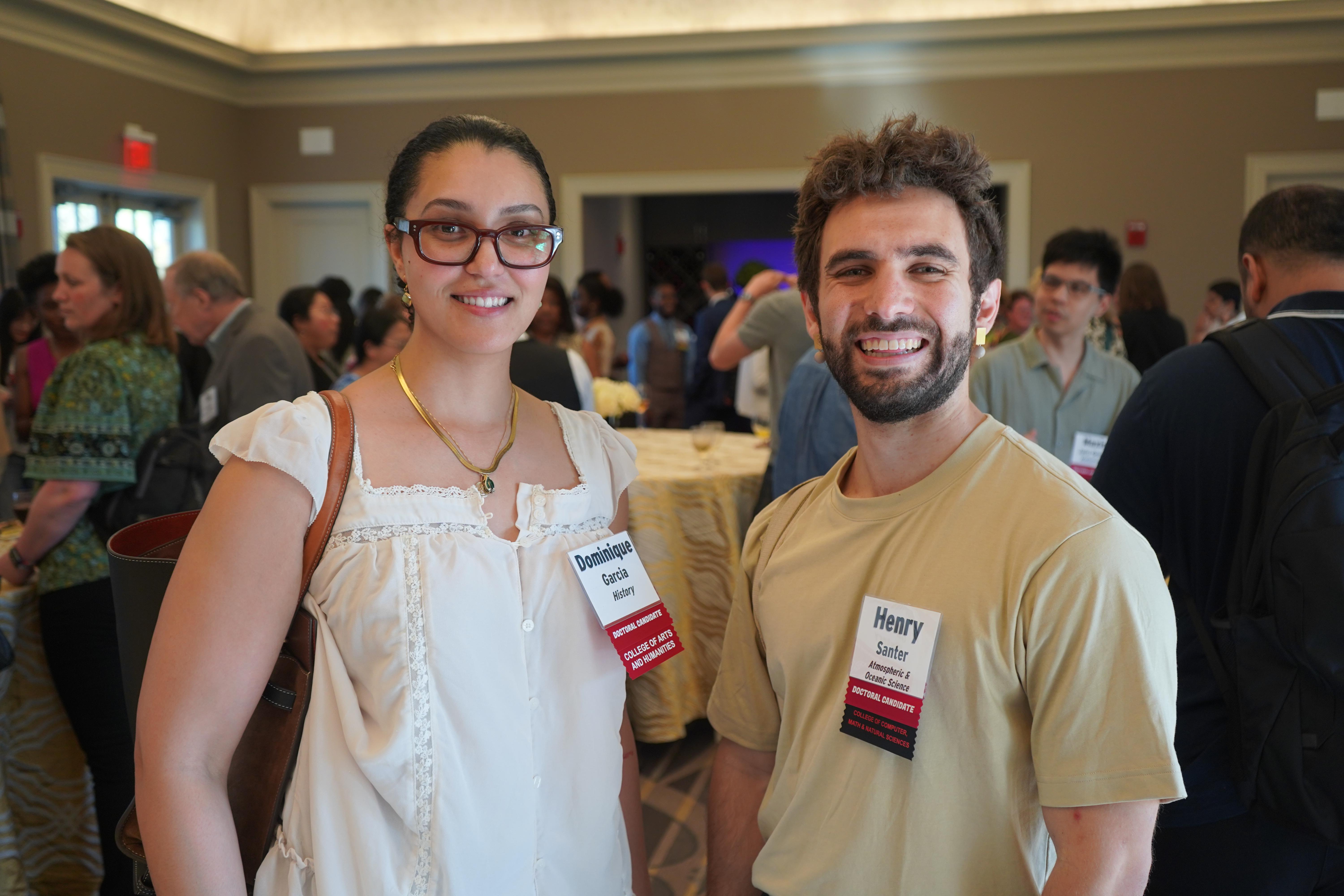 Two Doctoral Candidates at a celebration