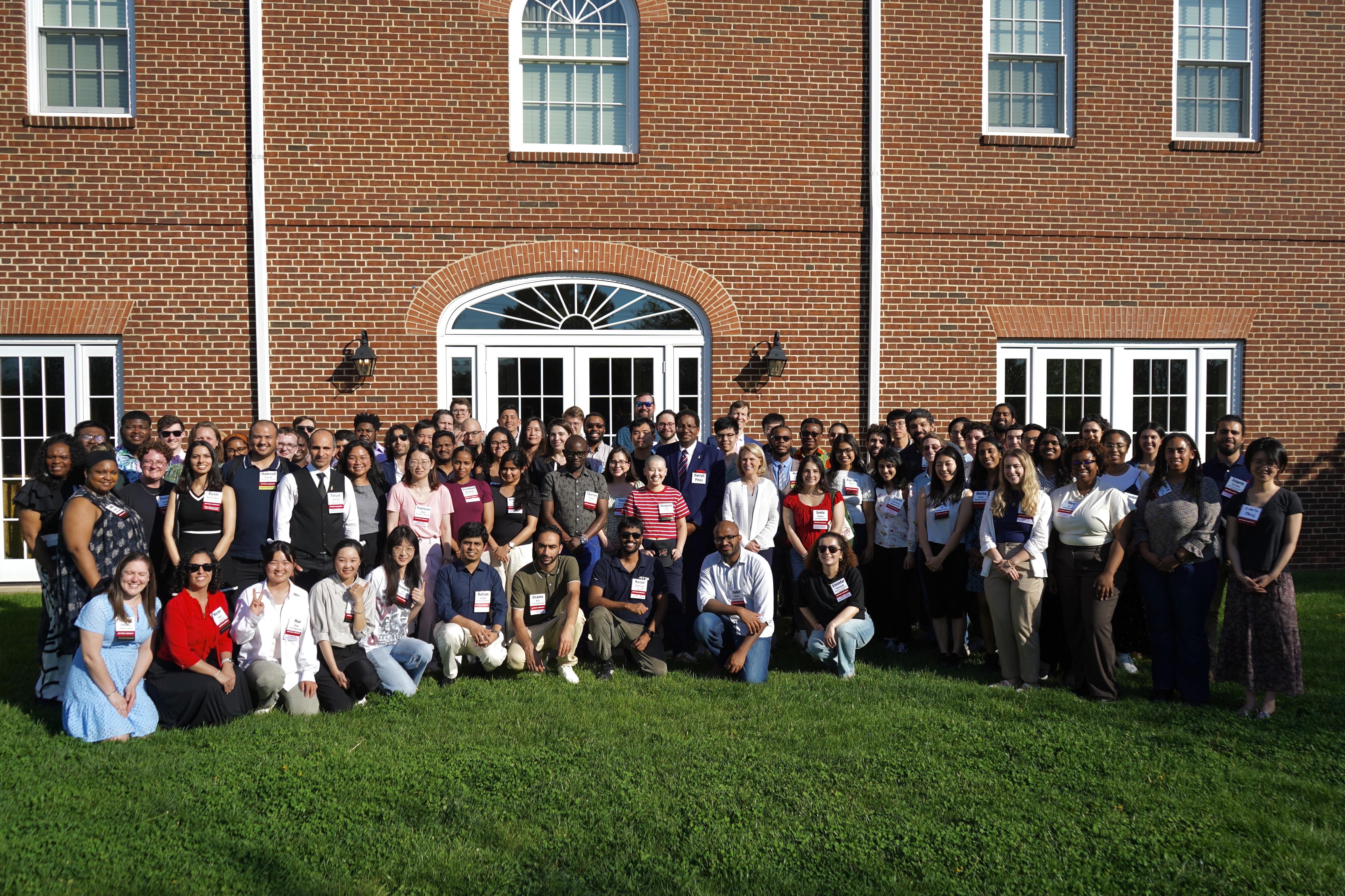Very large group of Doctoral Candidates at a celebration with President Pines and Dean Roth