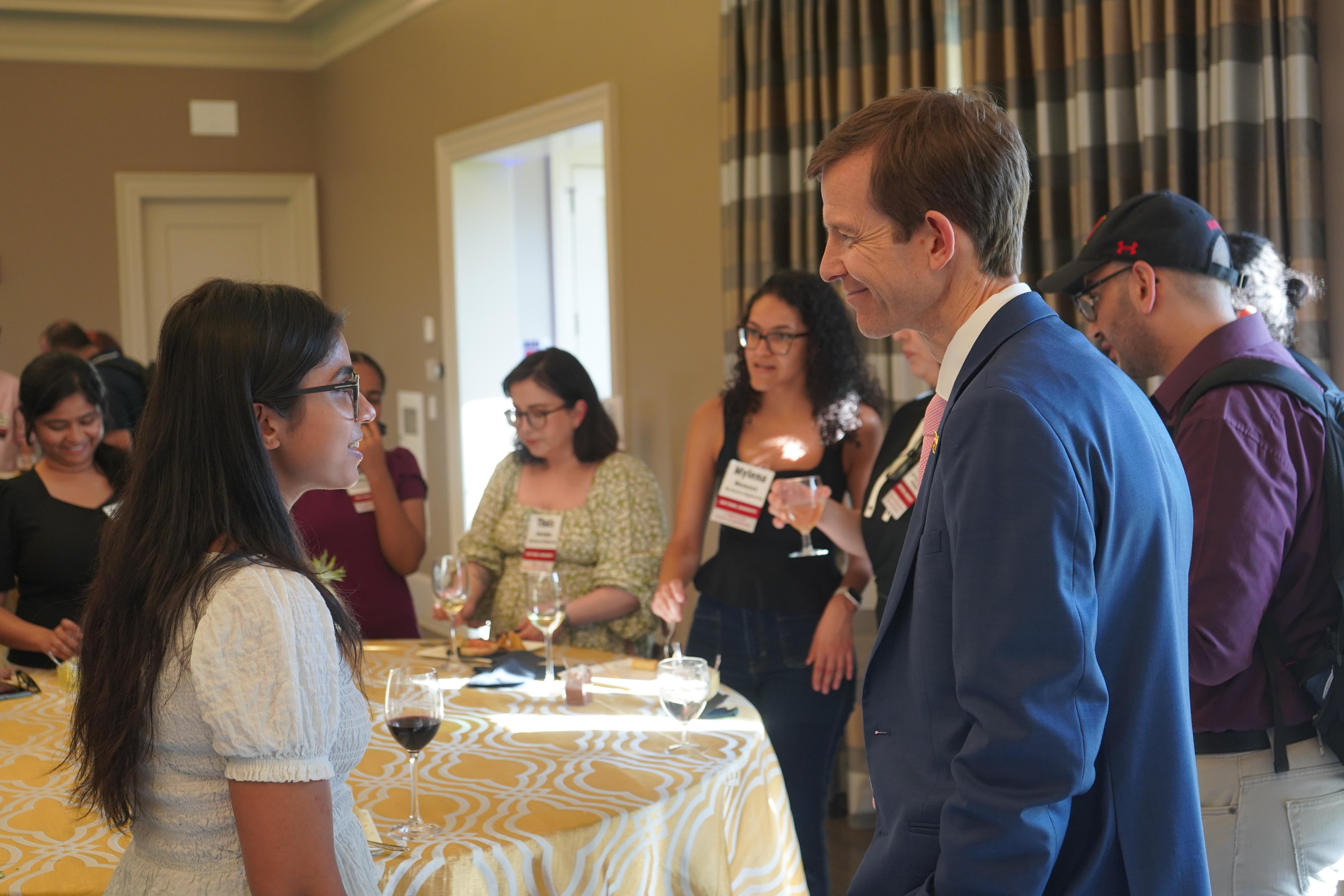 Doctoral Candidate and Dean Roth at a celebration