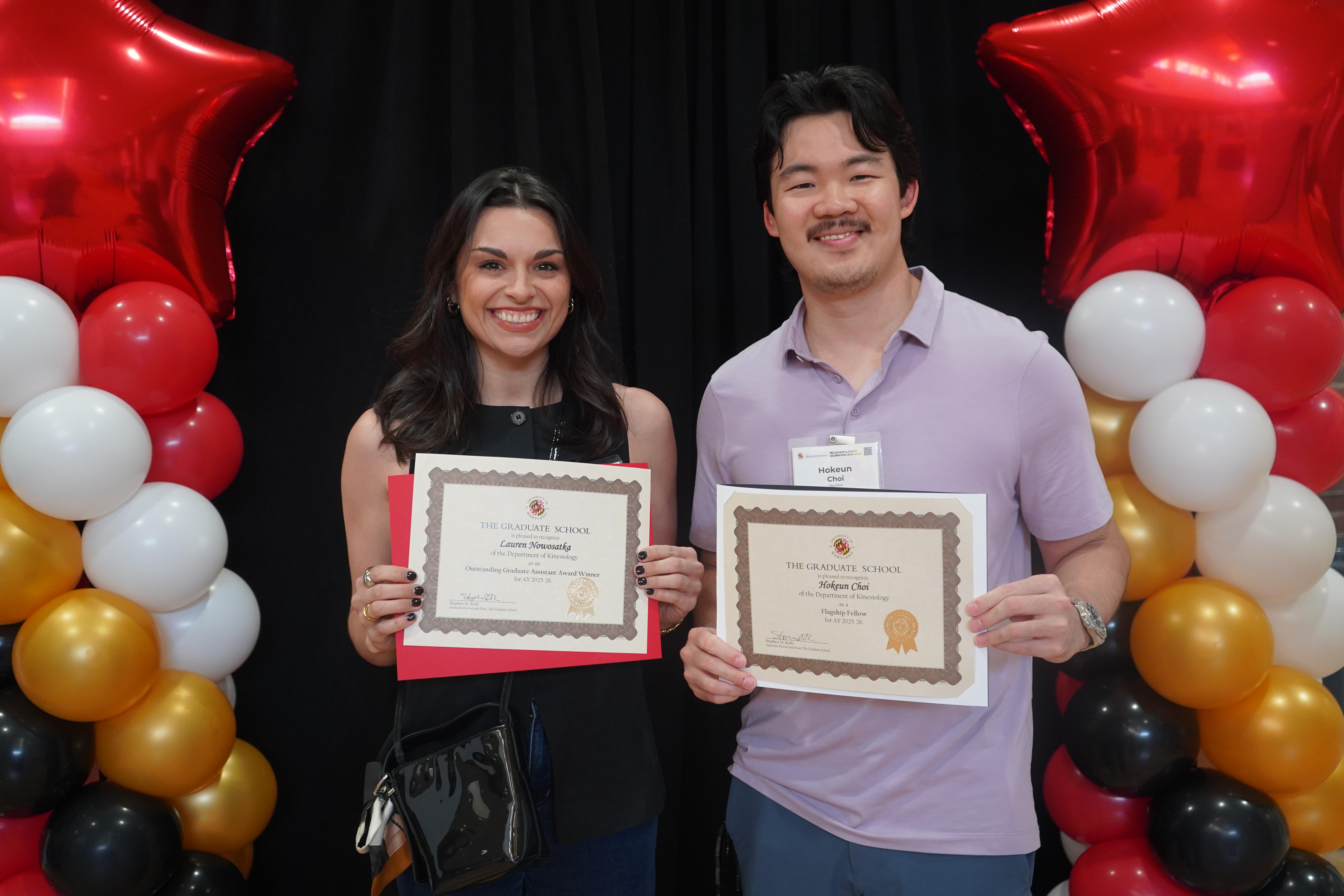 Two graduate students at the annual Fellowship and Award celebration