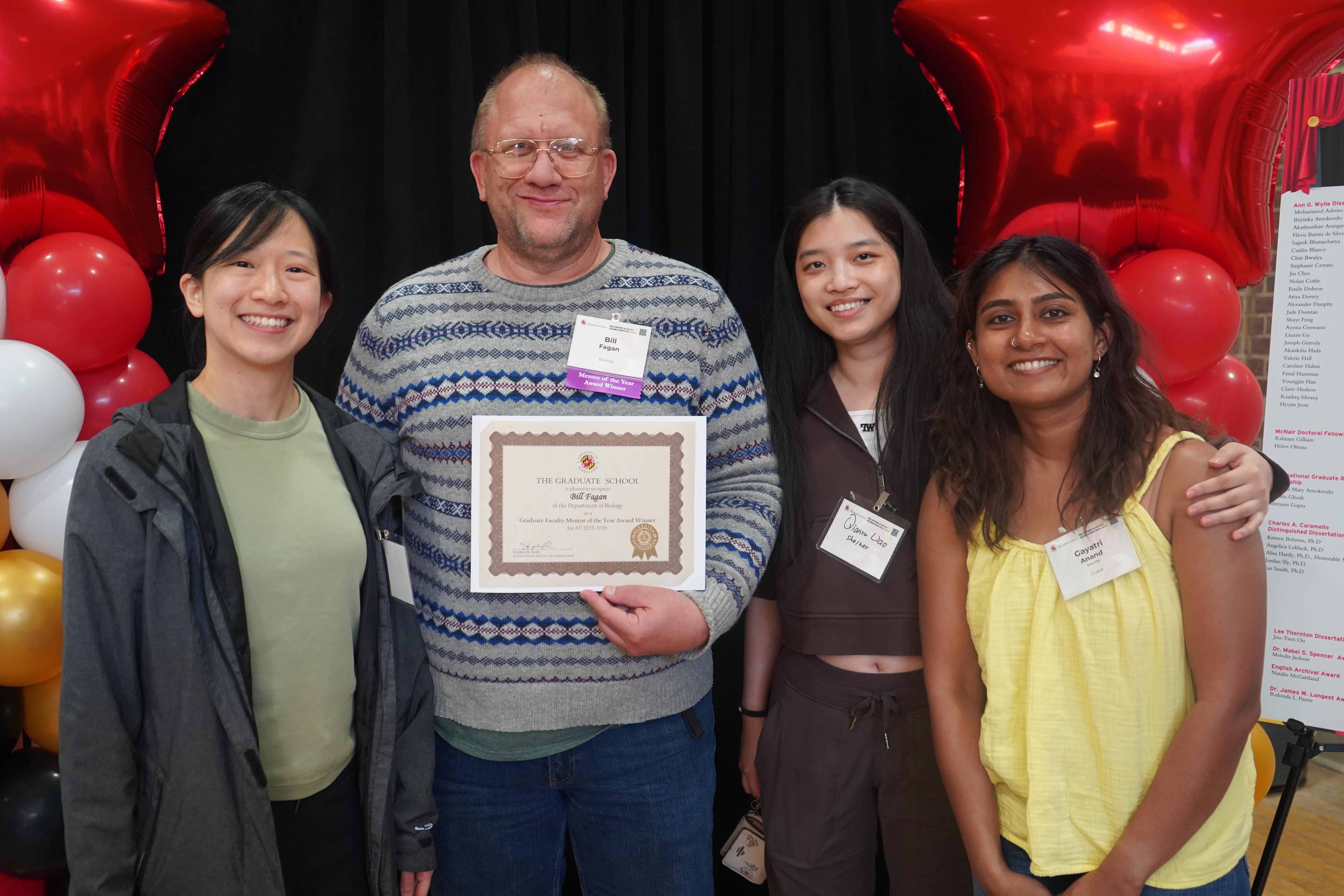 Four graduate students at the annual Fellowship and Award celebration