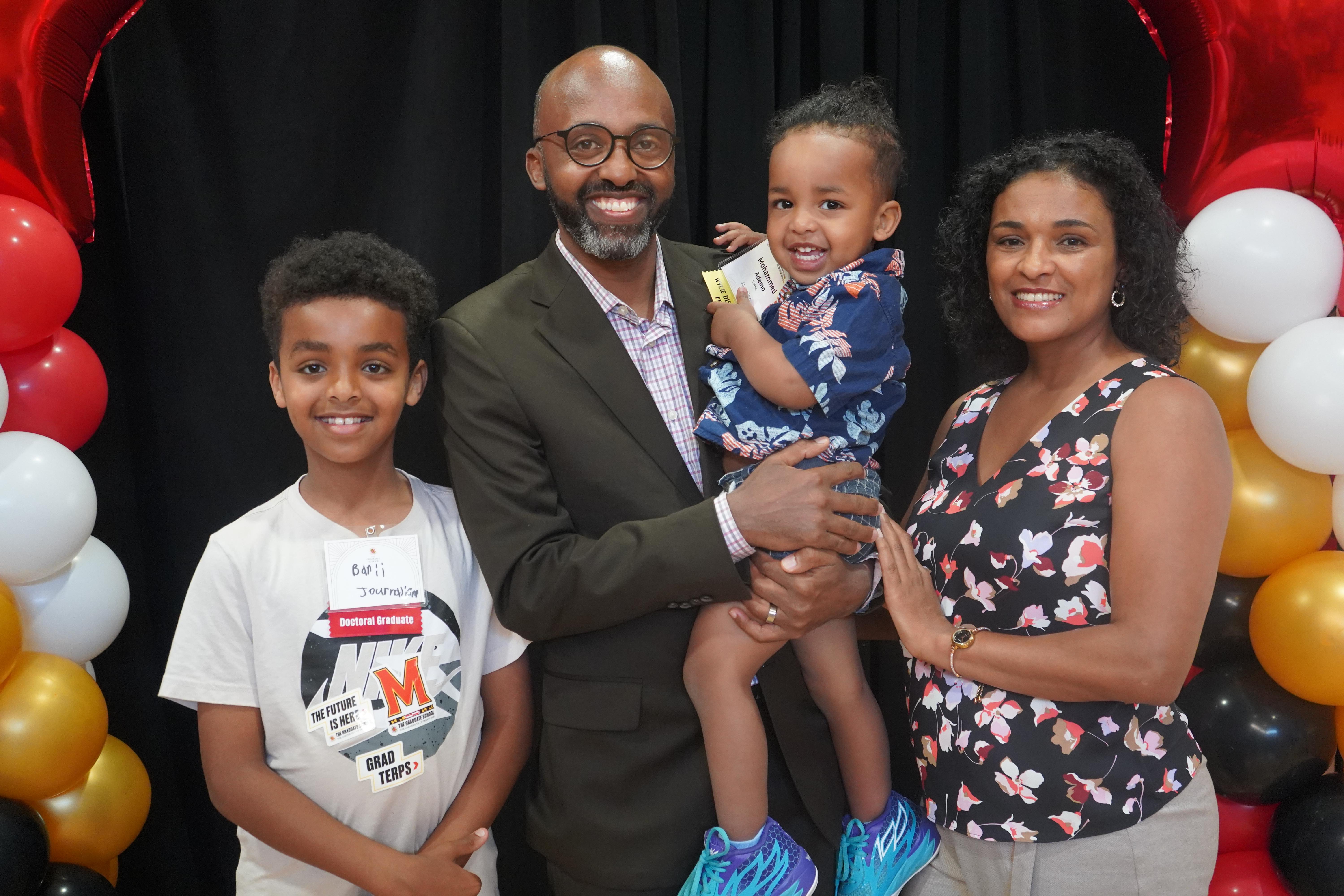 Family celebrating at Doctoral Graduate Celebration