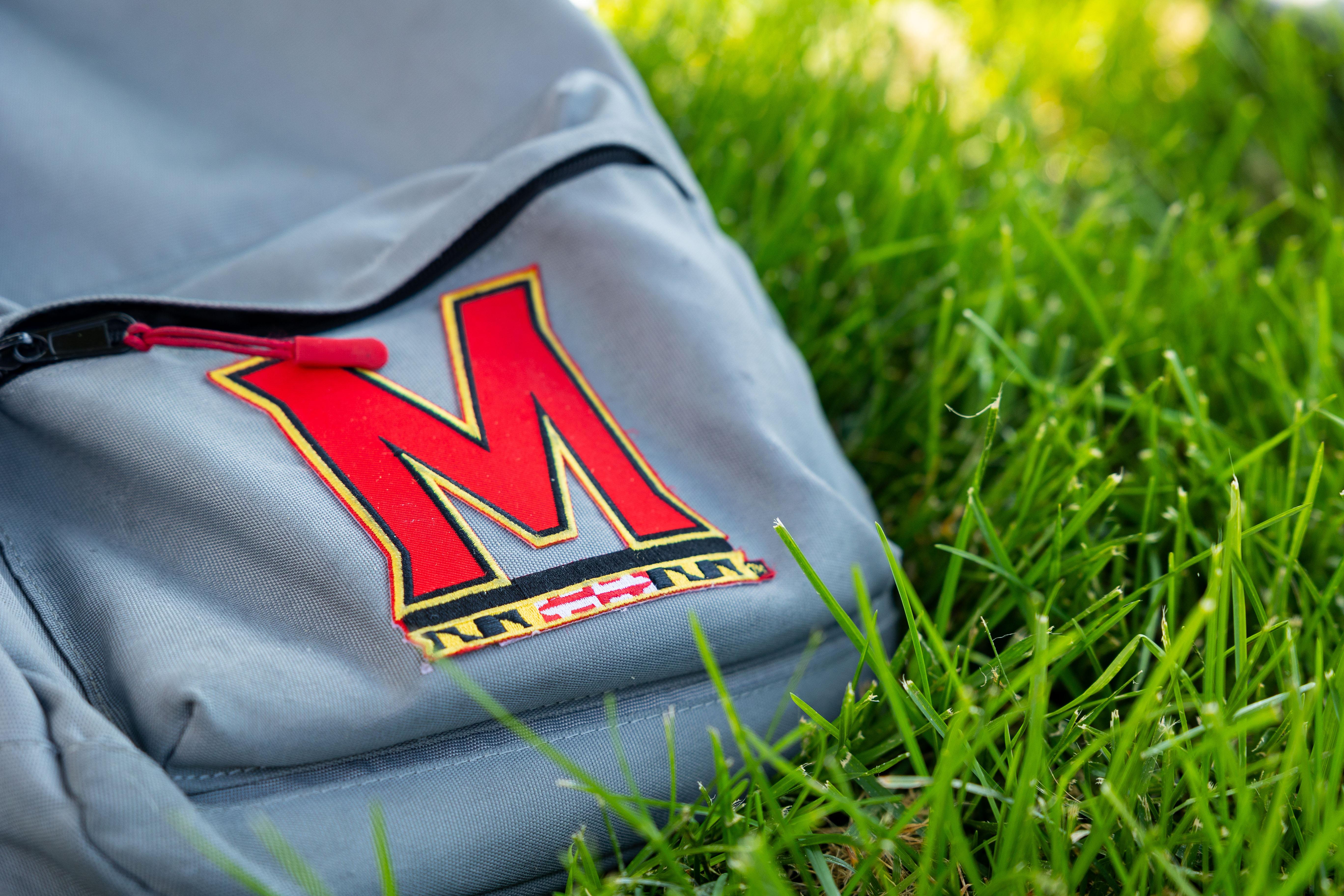UMD Backpack in the Grass